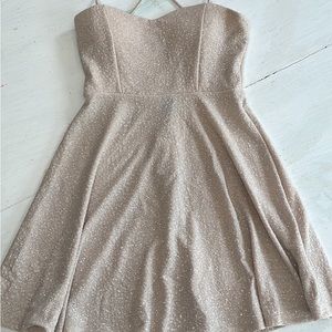 Sweet little homecoming dress. Taupe almost flesh color that sparkles.